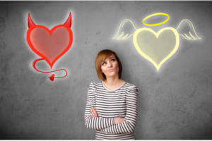 Person contemplating quitting cigarettes, symbolized by a devilish heart (addiction) and angelic heart (healthy lifestyle). Overcoming cigarette addiction through mindset shift.